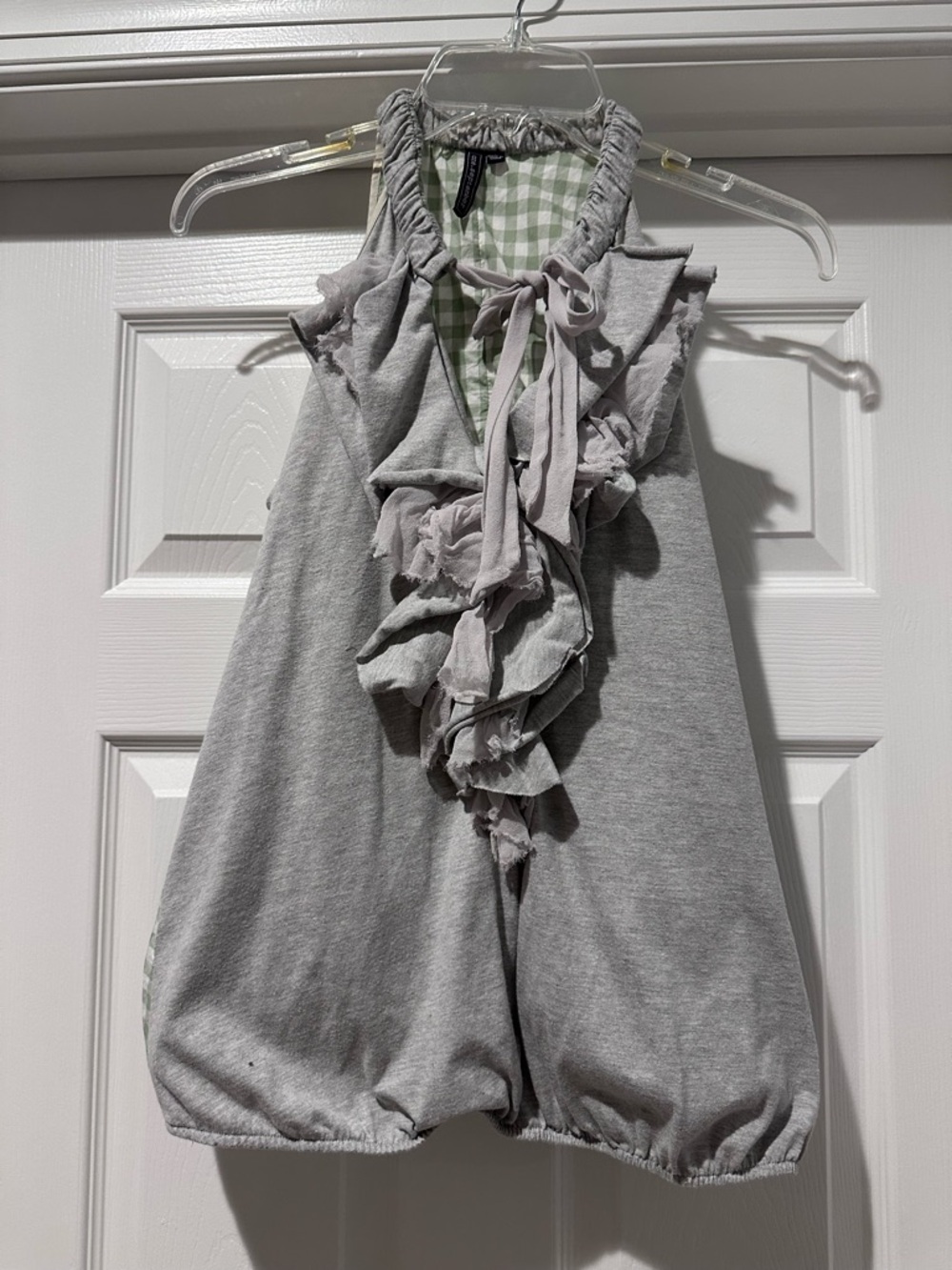 Anthropologie Ruffled Gray Sleeveless Top w/Ruffles and tie neck. Gingham back.